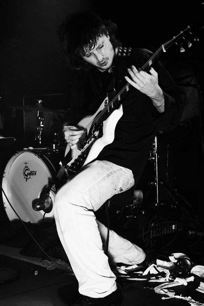 Cole Alexander from Black Lips photographed on stage at TV Eye in New York City by Alexander Thompson for Reserved magazine.