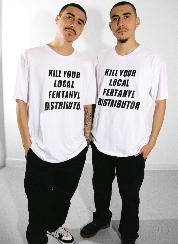 twins in white kill your local fentanyl distributor front tee courtesy Unholy War Studios