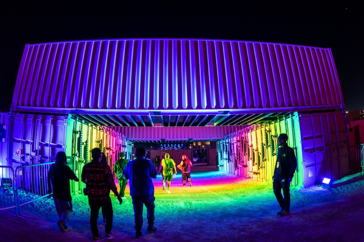 acid rainbow psycedelic entry way with stacked cargo crates