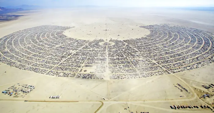 Desert X Closing 2023 black semi circle in the desert