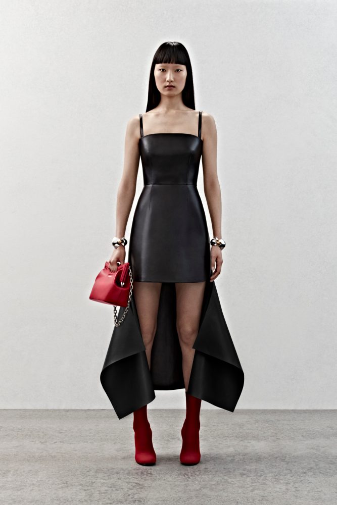 A slashed dress in bonded black leather.