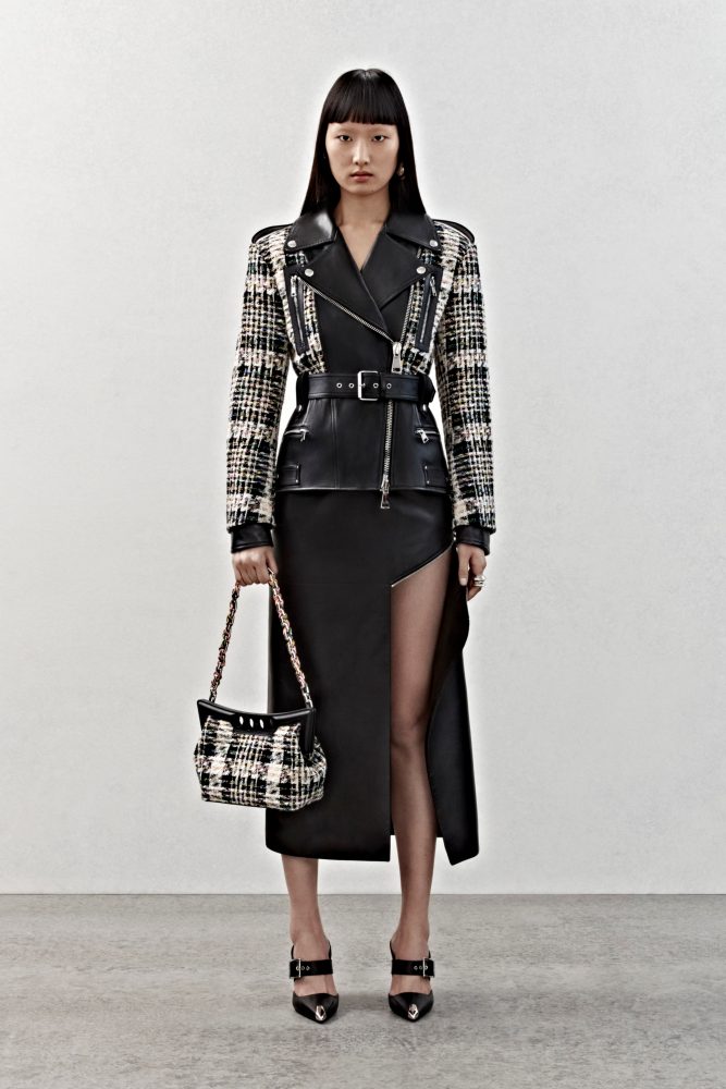 A biker jacket in coloured tweed and black leather and a slashed biker skirt in black leather.