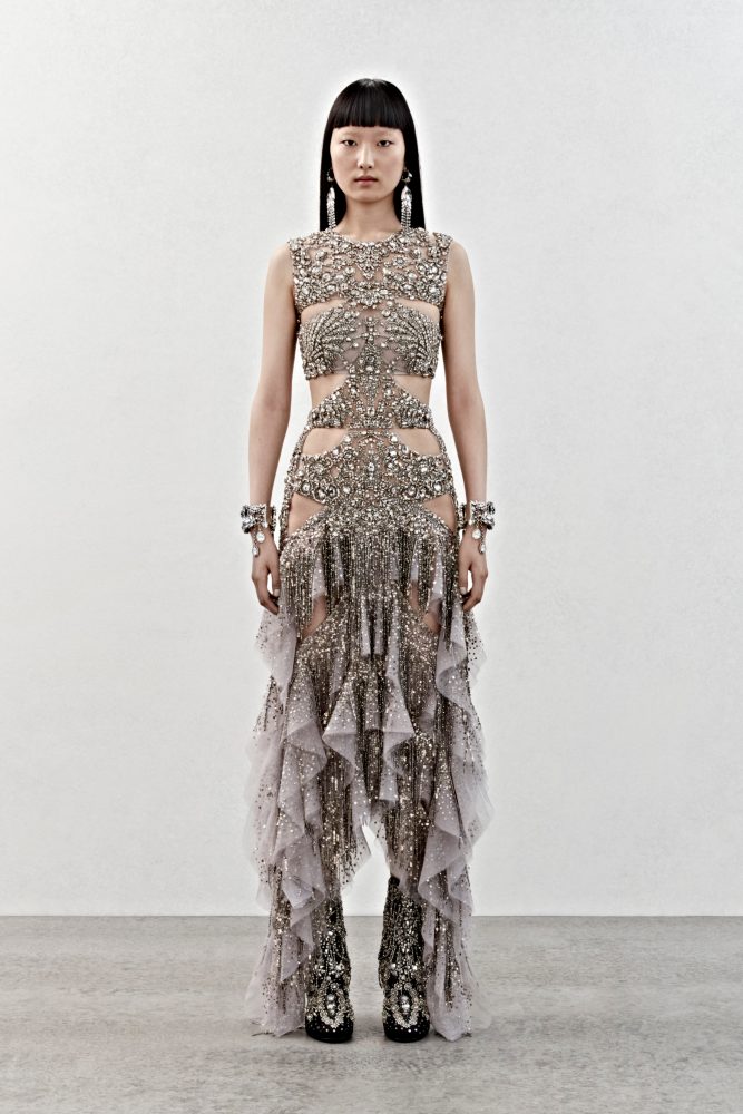 A slashed dress in tulle with crystal embroidery.