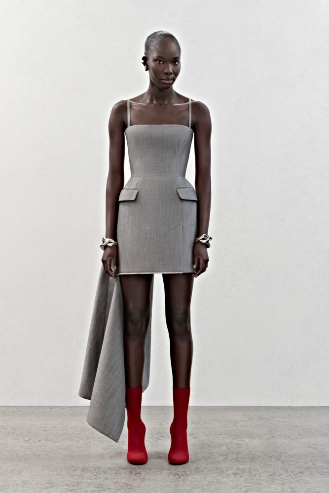 A slashed tailored dress in grey wool mohair with silver metal zip detailing.
