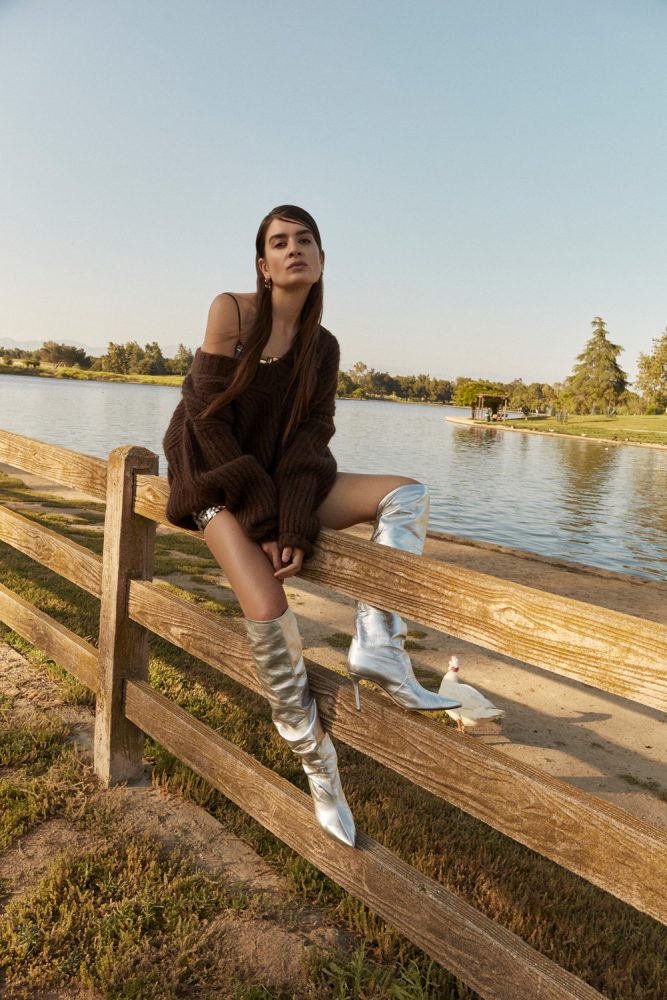 Natalia Bonifacci wears sweater and skirt by MSGM, earrings by Hannah Jewett, and stylist's shoes. image 2 photographed by Mathilde Bresson