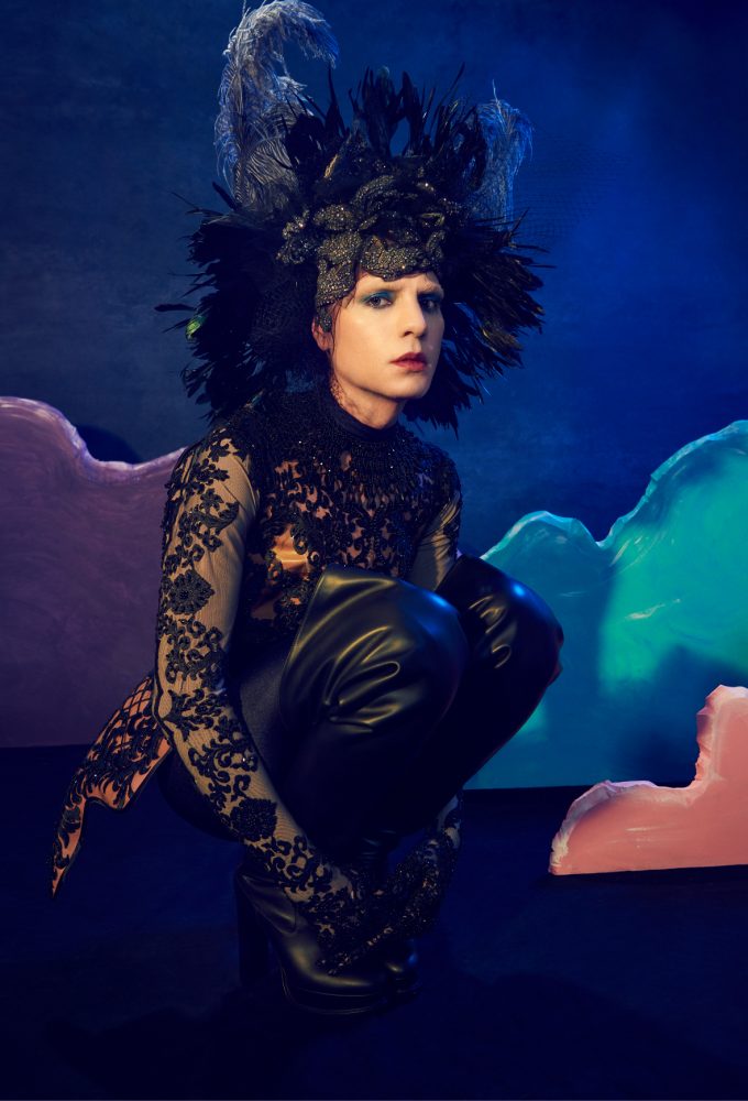 Jordan Roth wears Syban bodysuit, Alexander McQueen corset, Balenciaga catsuit and vintage necklaces.