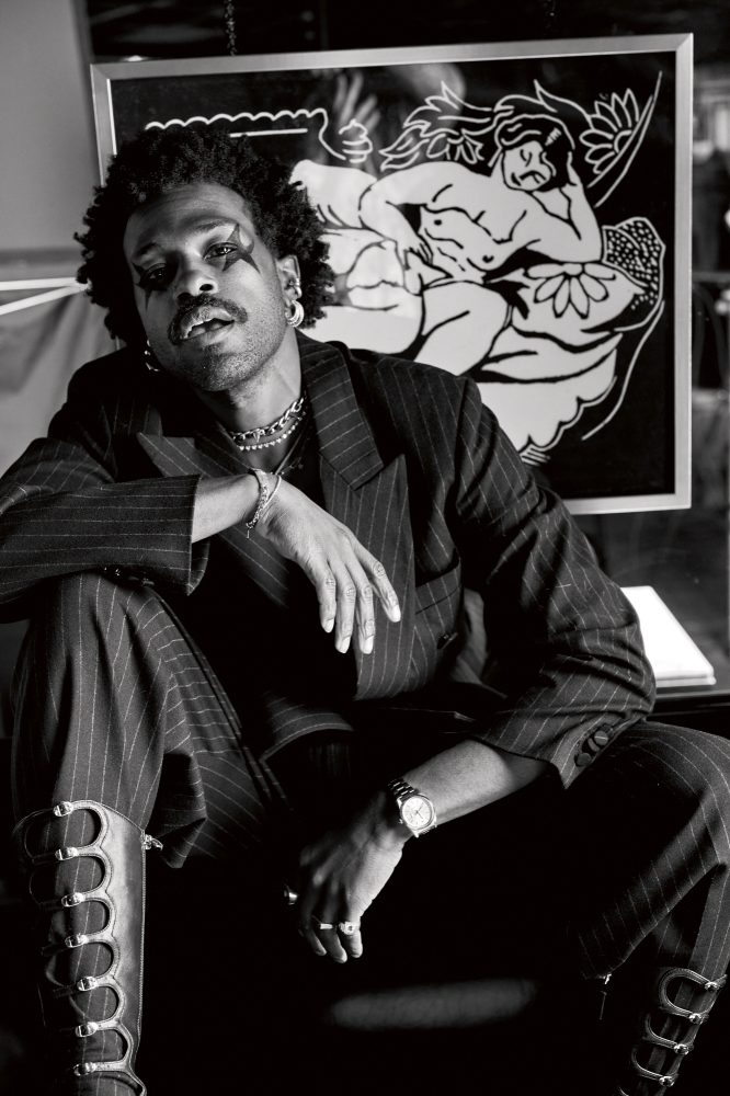 Reserved Magazine DUCKWRTH JESSE LIROLA Luca Kingston Amanda Lim cover Duckwrth wears PLAN C suit, MARC JACOBS boots, and BVLGARI jewelry.