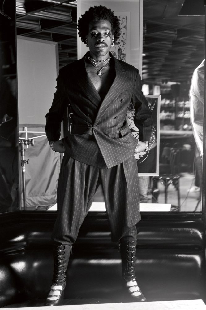 Reserved Magazine DUCKWRTH JESSE LIROLA Luca Kingston Amanda Lim cover Duckwrth wears PLAN C suit, MARC JACOBS boots, and BVLGARI jewelry.