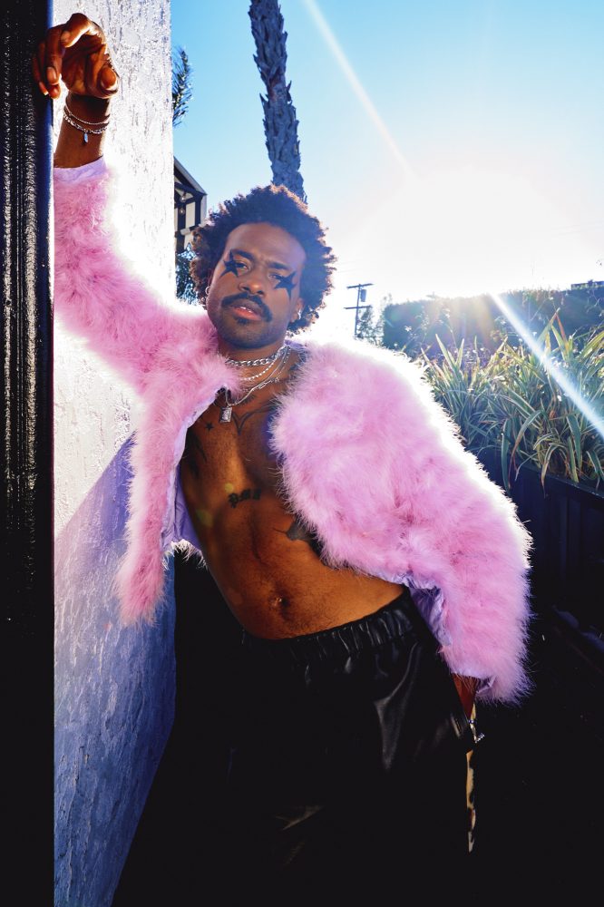 Reserved Magazine DUCKWRTH JESSE LIROLA Luca Kingston Amanda Lim cover Duckwrth wears NIKITA KARIZMA Jacket, MARNI pants, and SHAY Fine jewelry.