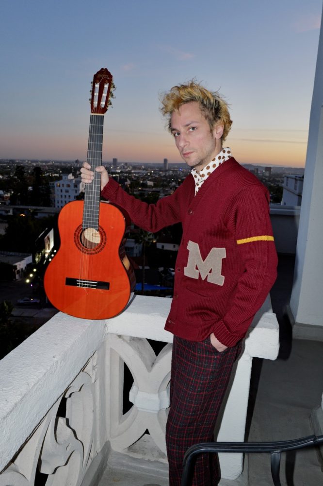 Reserved Magazine Marlon Magnee Photographed by Kevin Hayeland at the chateau marmont balcony