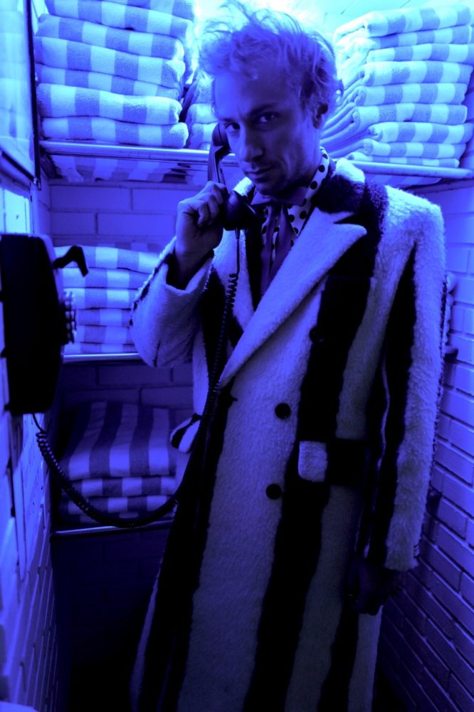 Reserved Magazine Marlon Magnee Photographed by Kevin Hayeland at the chateau marmont blue lights
