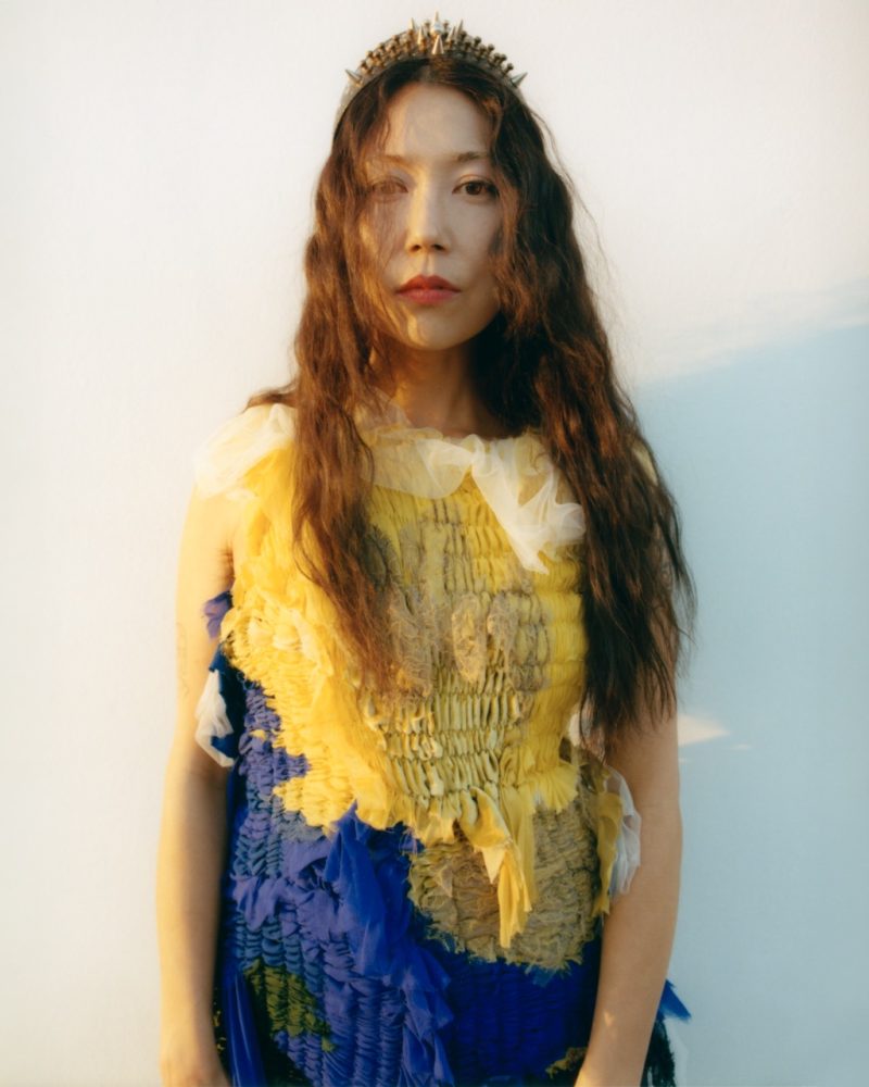 Sasami wears CAROLINE HU dress and Archive COMME DES GARCONS HOMME PLUS crown. Written and Produced by BJ Panda Bear. Photographed by Andrew Friendly. Styled by Britton Litow. Hair: Paul Rizzo using Bumble and Bumble. Makeup: Nichole Servin using Westman Atelier and Rare Beauty. Stylist Assistant: Maddie Collins.