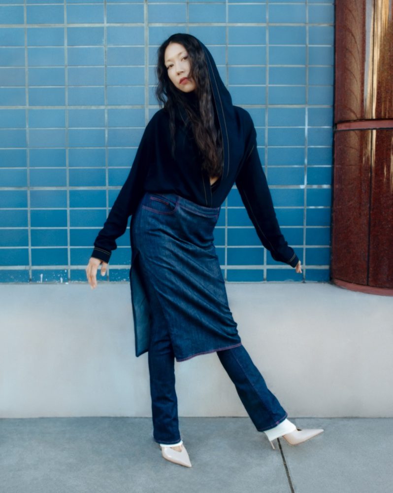 Sasami wears ALAÏA bodysuit and pants available at FWRD, CASADEI shoes, MENĒ necklace, and bra and tights stylist’s own. Written and Produced by BJ Panda Bear. Photographed by Andrew Friendly. Styled by Britton Litow. Hair: Paul Rizzo using Bumble and Bumble. Makeup: Nichole Servin using Westman Atelier and Rare Beauty. Stylist Assistant: Maddie Collins.